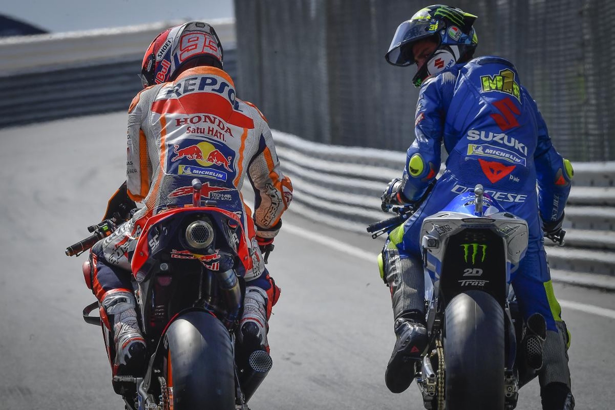 Joan Mir and Marc Marquez on the MotoGP circuit. Media sourced from Motorsport.