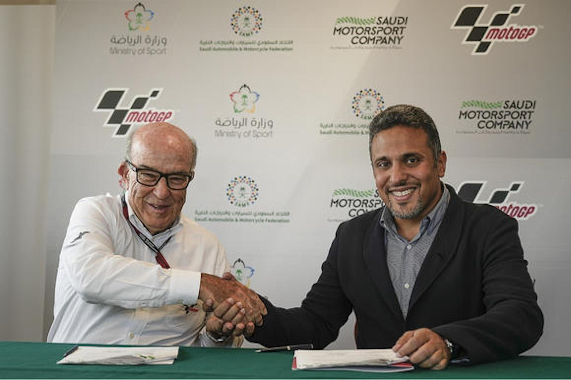 Carmelo Ezpeleta signing a memorandum of understanding with the Saudi Arabian Motorsport Company. Media sourced from Motorcycle Sports. 