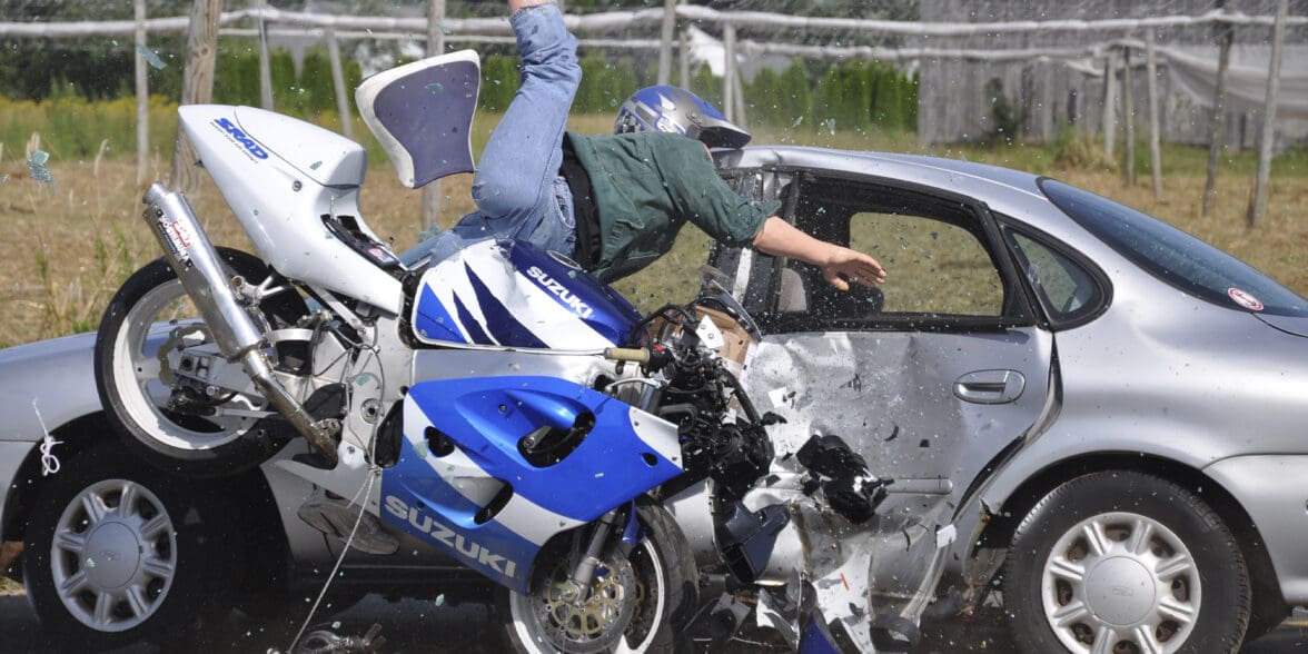 Motorcycle crash test against a car