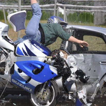 Motorcycle crash test against a car