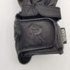 Logo on gauntlet closure of Raven Moto Trauma gloves