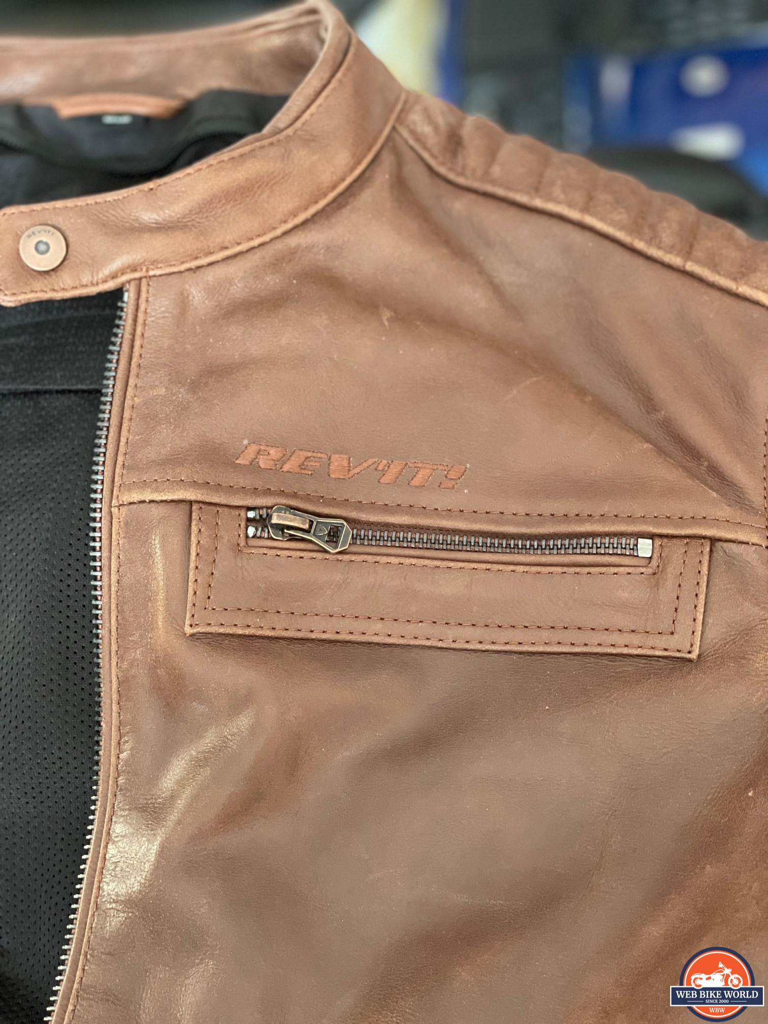 Close-up of REV'IT logo on Restless jacket