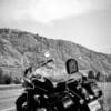 Author's motorcycle parked on shoulder of mountain road during testing for Scorpion EXO Covert Ultra Jeans