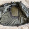 Inside of Scorpion EXO Covert Waxed Riding Shirt showing pockets for optional armour