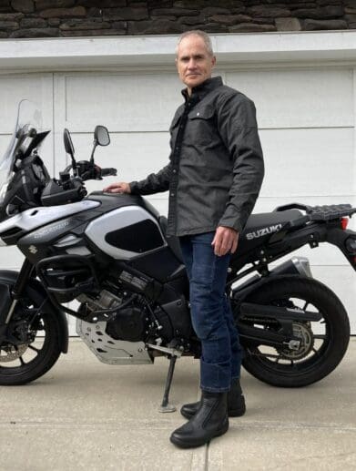 Author wearing Scorpion EXO Covert Waxed Riding Shirt next to motorcycle