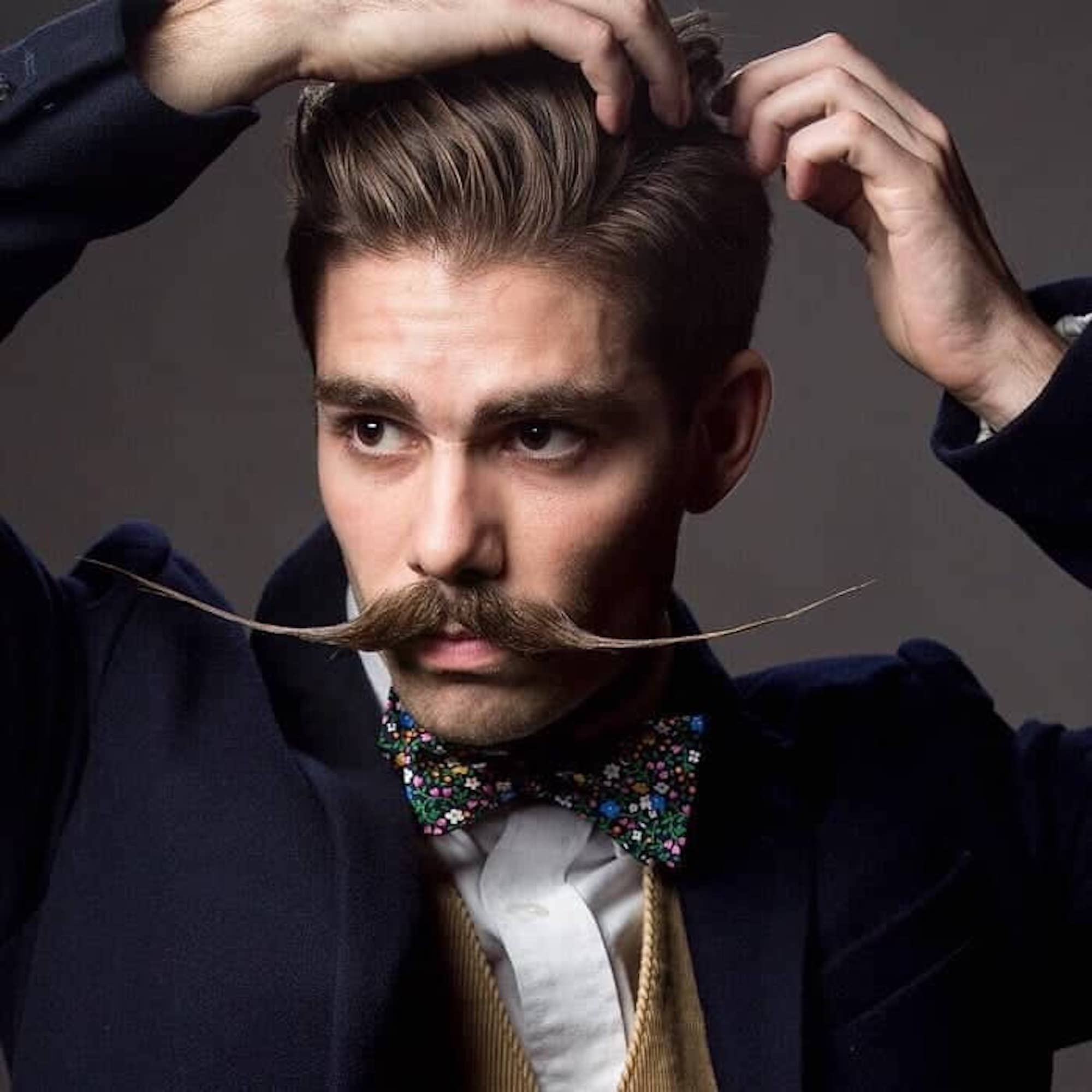 A dapper gentleman with a very dapper 'stache. Media sourced from