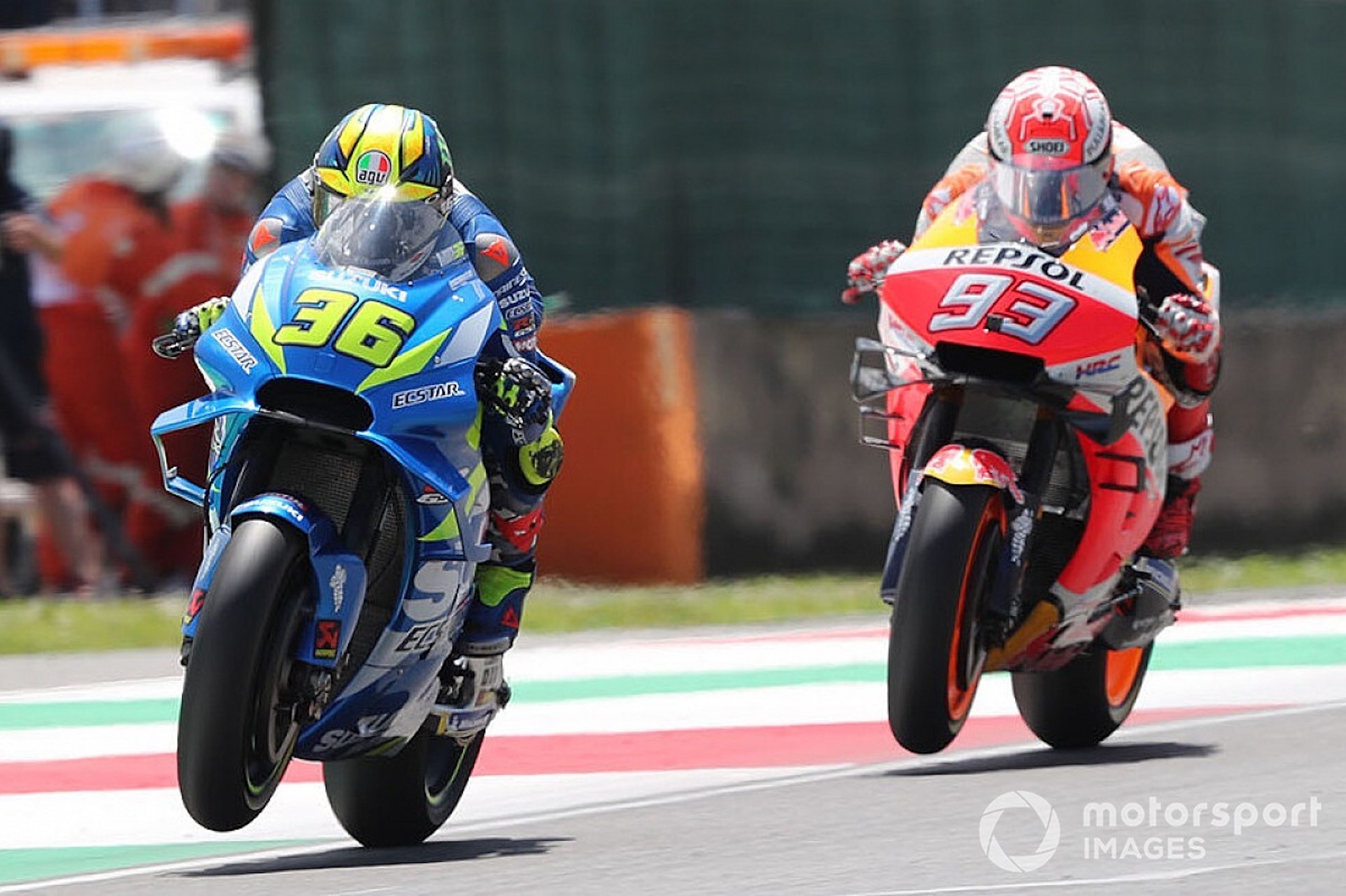 Joan Mir and Marc Marquez on the MotoGP circuit. Media sourced from Motorsport.