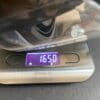 Scale showing weight of Nexx X.Vilitur Carbon Zero Pro helmet
