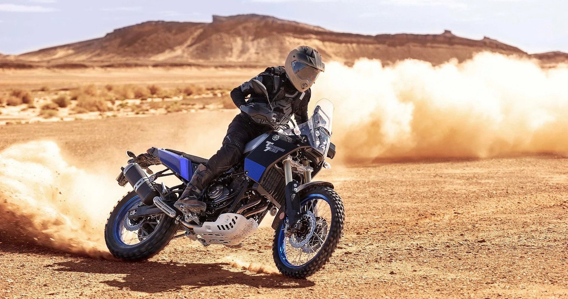 Motorcyclist on an adventure bike in the desert