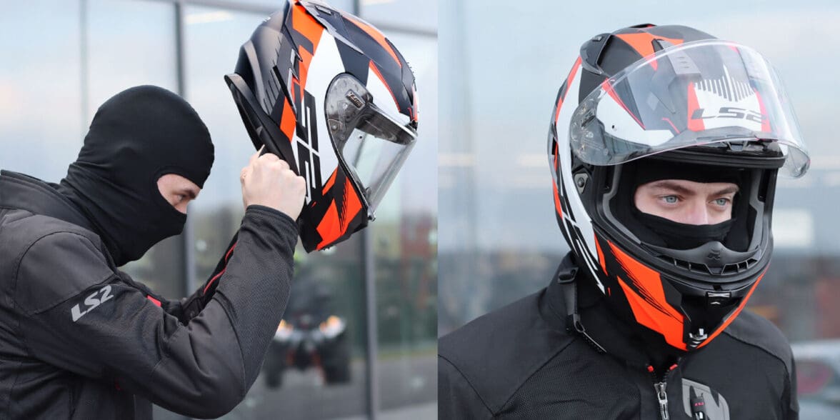 An image of a rider wearing a balaclava putting on his helmet.