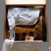 Open box exposing Fuel Dust Devil Boots