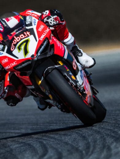 A rider leaning into the approaching curve. Media sourced from Fuel Curve.