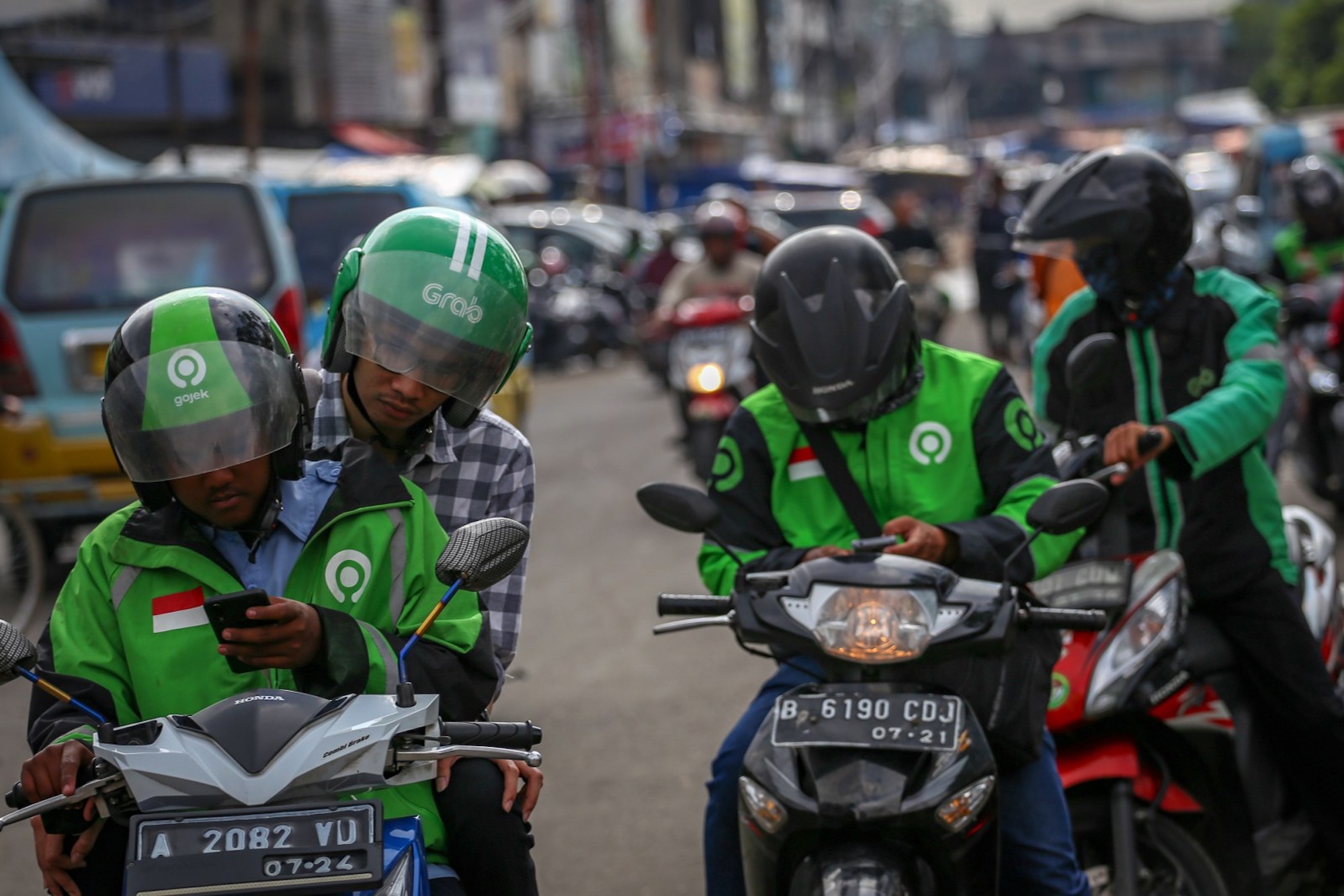 'OJEK Online,' an online motorcycle business currently under scrutiny by Indonesia's Workers Union (SPAI). Media sourced from Kumparan.