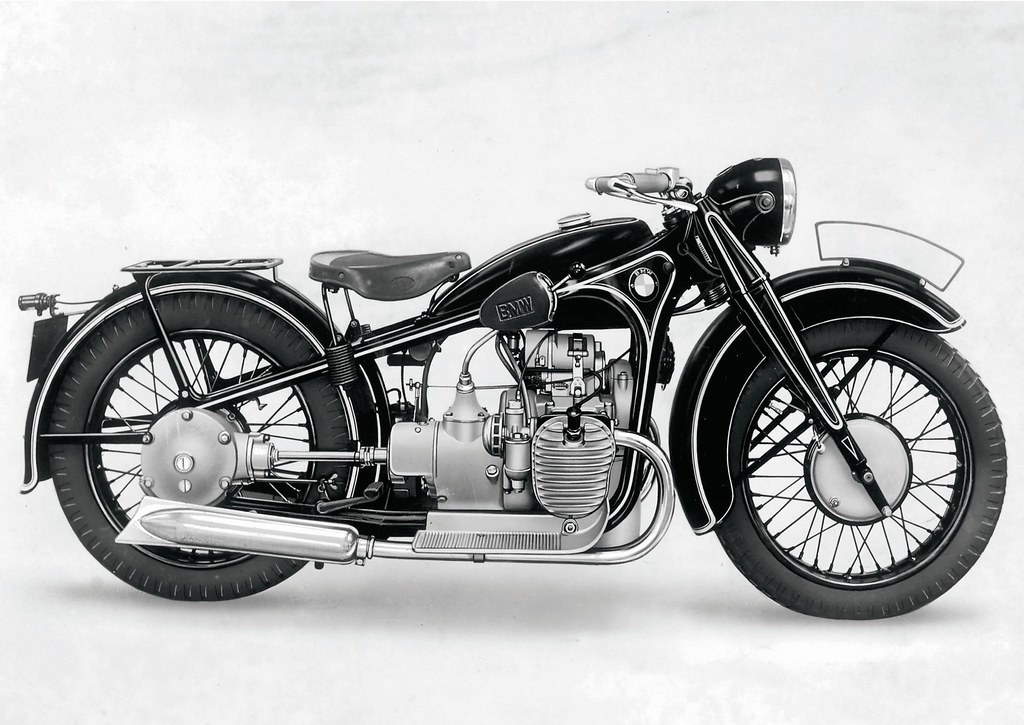 An historical photo of a 1935 BMW R12 motorcycle