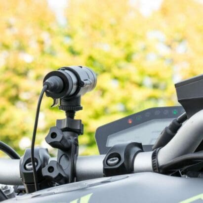 An image of a dash cam mounted on the tank of a Yamaha MT-09.