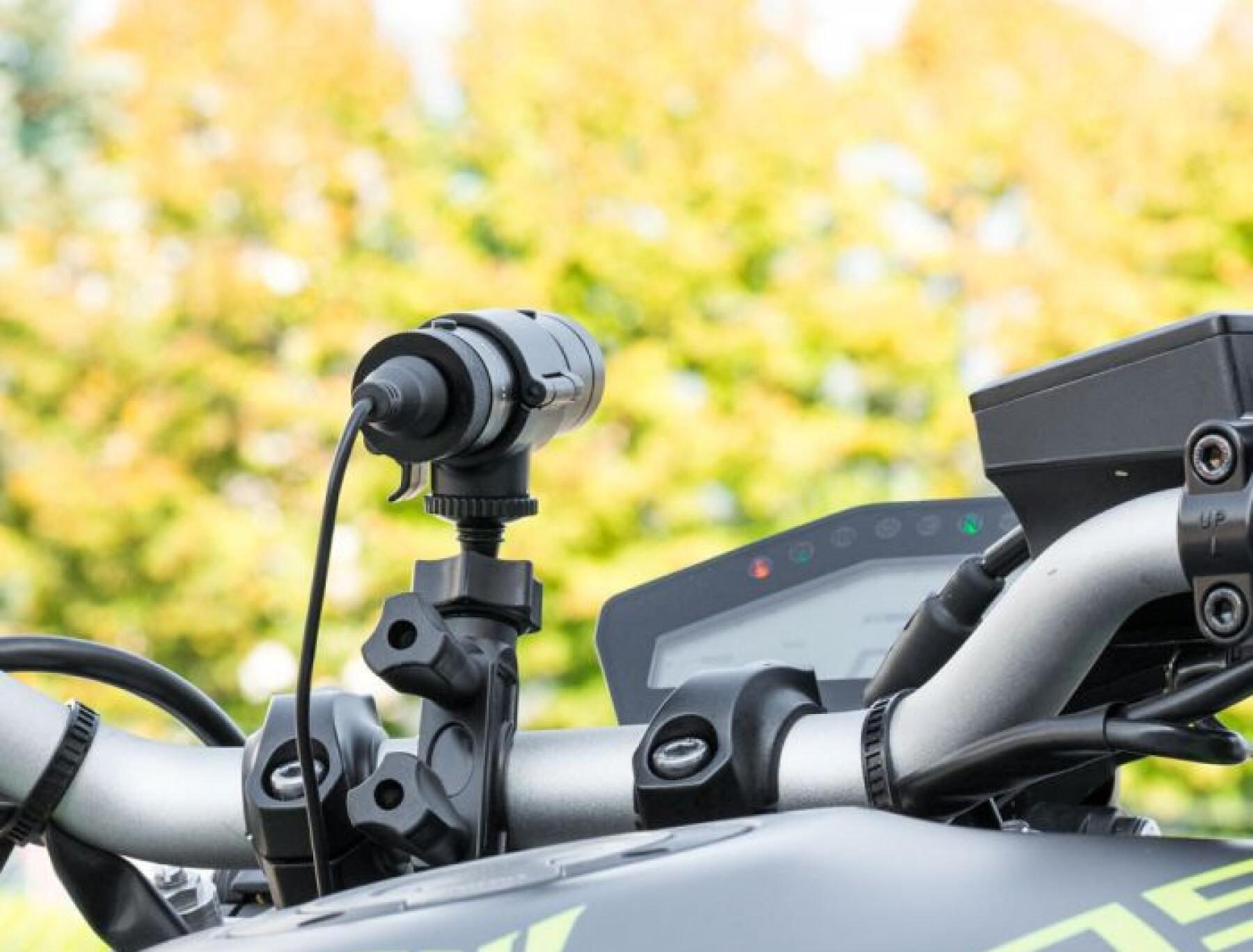 An image of a dash cam mounted on the tank of a Yamaha MT-09.