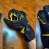 Three images showing author's hand in different positions inside Racer USA Women's Pitlane Gloves