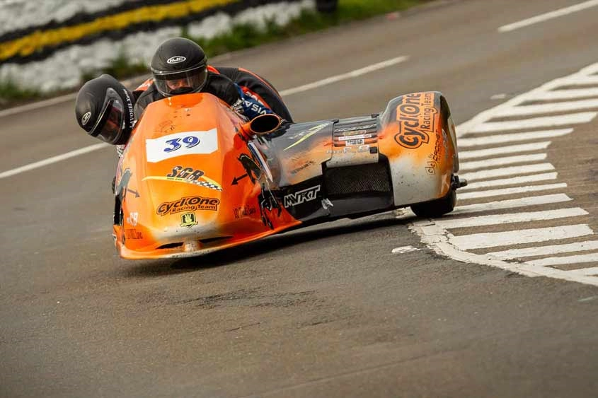 A view of Cesar Chanel and Olivier Lavorel in the opening race of the sidecar category for Isle of Man TT. Media sourced from MCN.