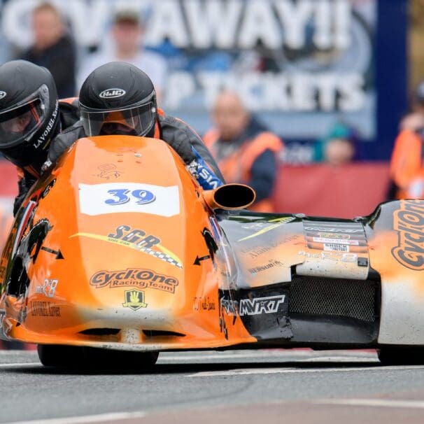 A view of Cesar Chanel and Olivier Lavorel, both of whom participated in the Isle of Man TT sidecar race that claimed both their lives. Media sourced from ITV Hub.