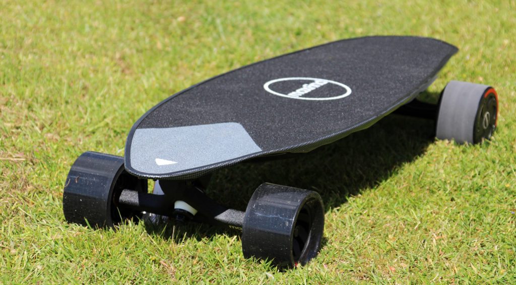 Maxfind Max2 Pro mini electric skateboard on grass