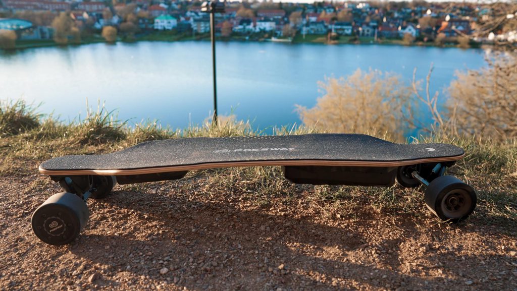 Possway T2 electric skateboard off-road near lake