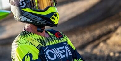 Image of a rider wearing a Bell Moto-9 MIPS helmet.