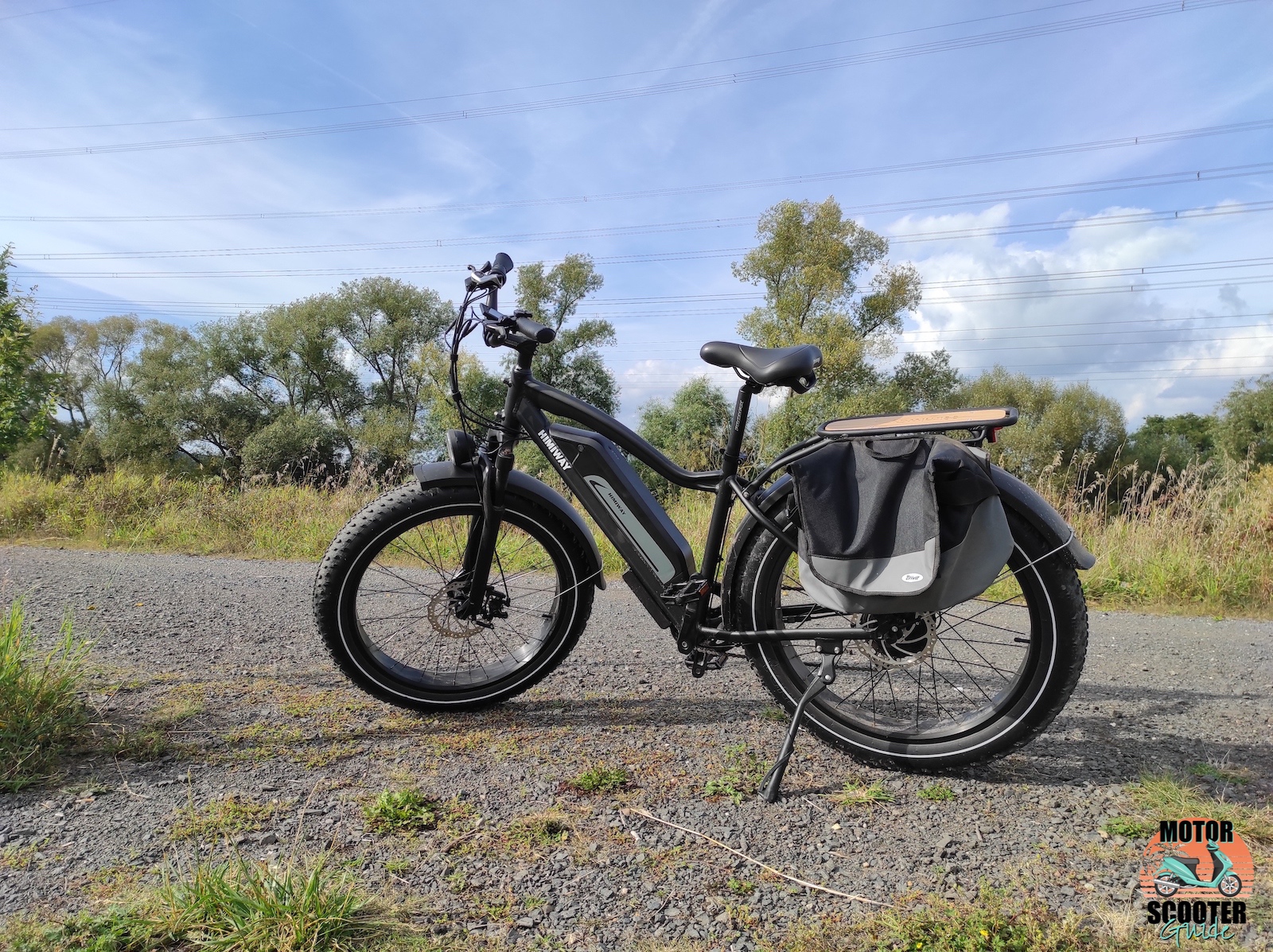 2021 Himiway All-Terrain Cruiser parked on dirt road with kickstand down