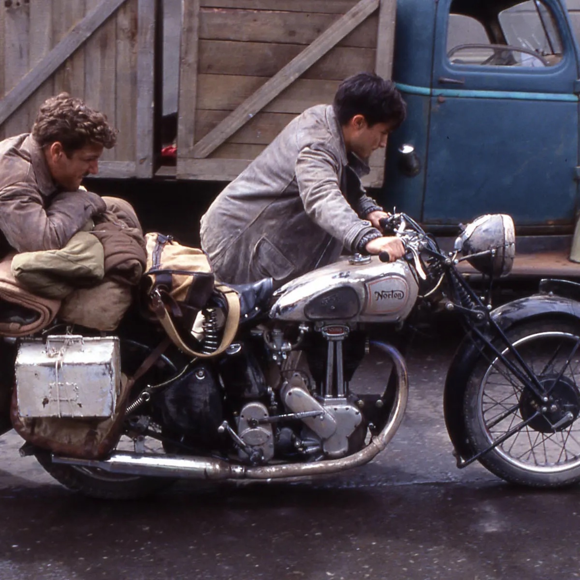 two guys pushing a bike... nothing to see here.  Media taken from The Guardian.