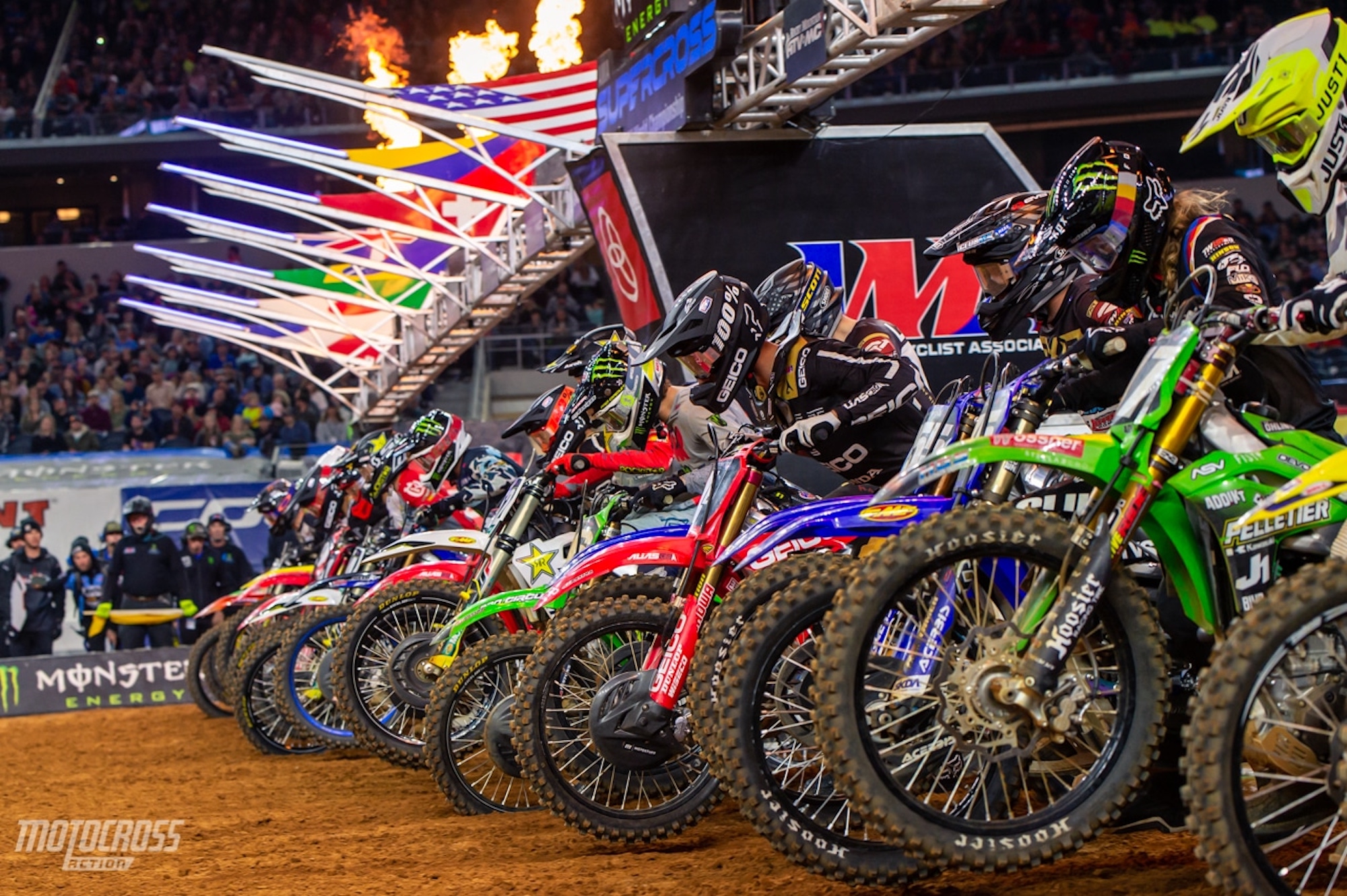 A lineup of motocross competitors waiting for the green light. Media sourced from Motocross Action Magazine.