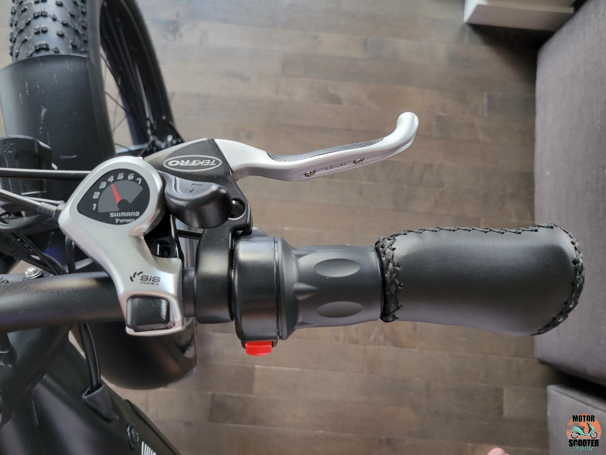 Closeup of the twist throttle and 7-speed shifter on the right side of the handlebar
