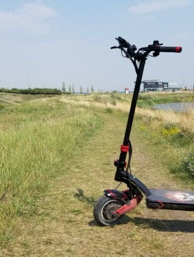Varla Eagle One scooter on grass path