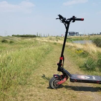 Varla Eagle One scooter on grass path