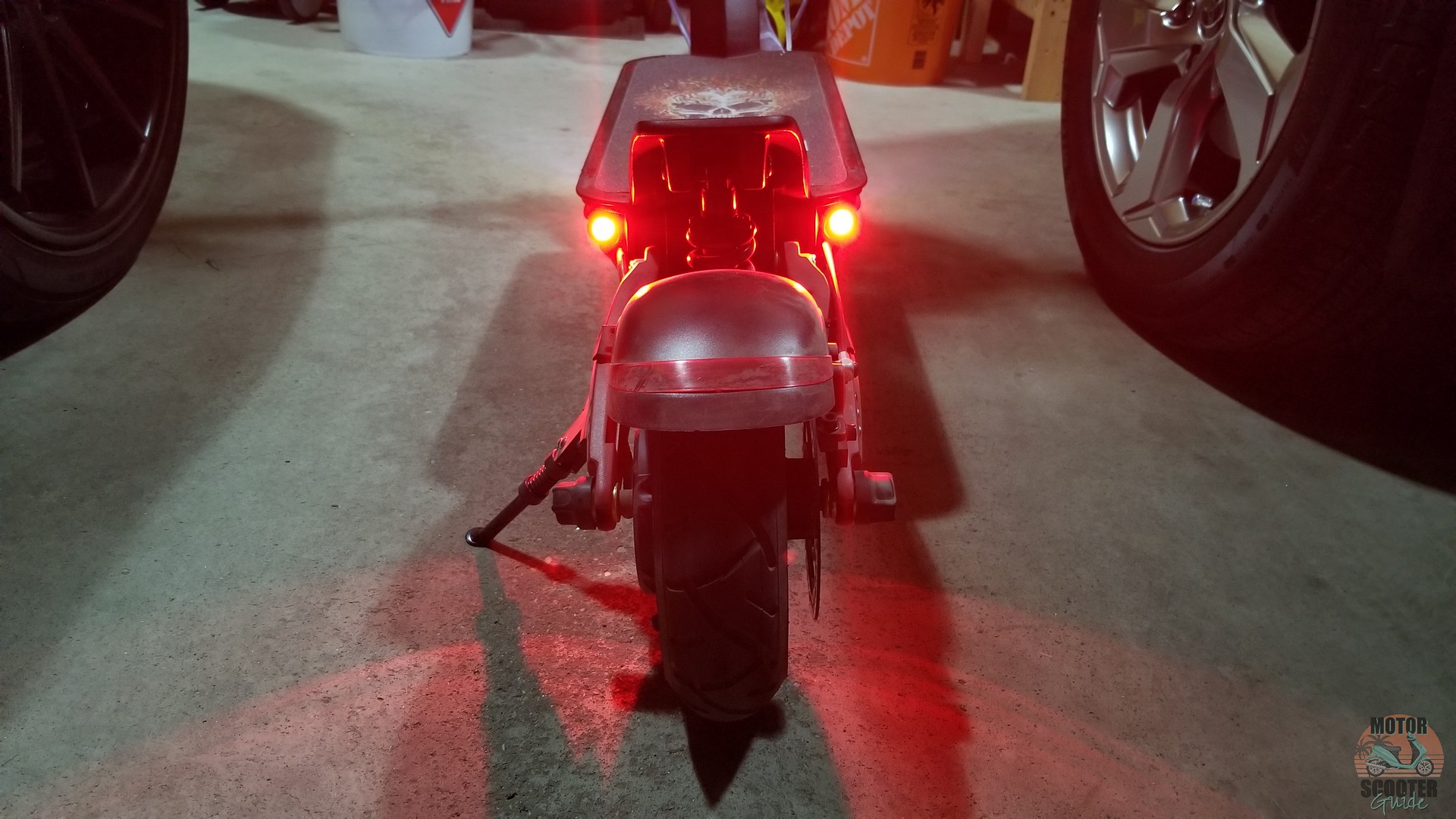 Red LED tail lights on the Varla Eagle One scooter