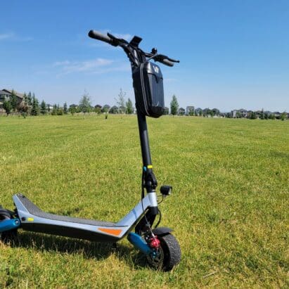 Varla Pegasus Scooter parked in field