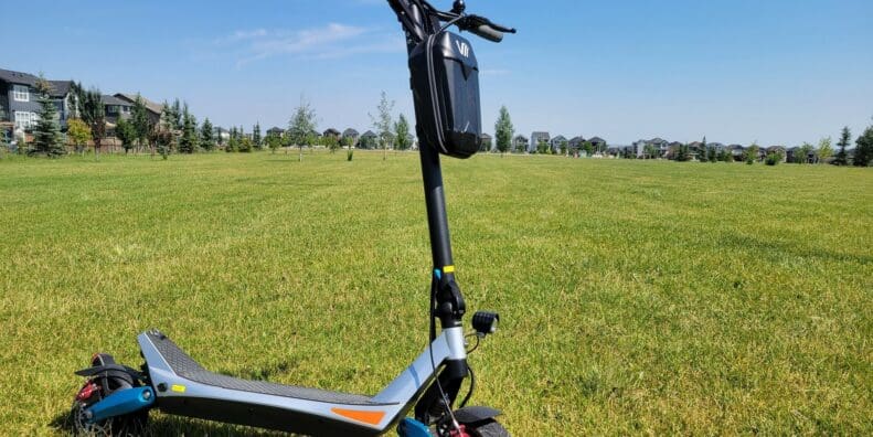 Varla Pegasus Scooter parked in field