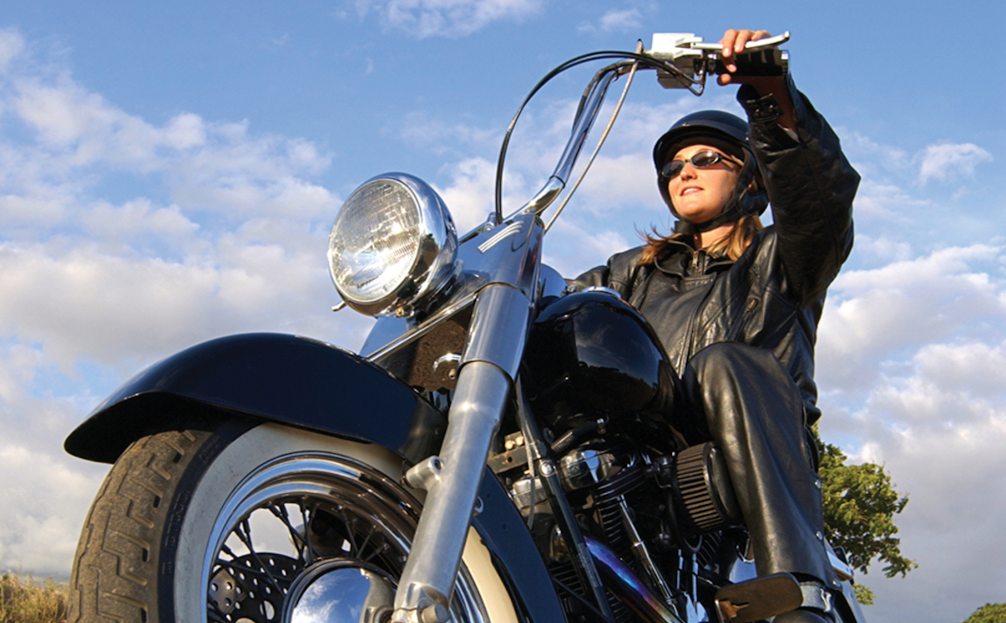 A motorcyclist enjoying cost-per-mile insurance - currently onyl a thing in the UK. Media sourced from Insurance POST.