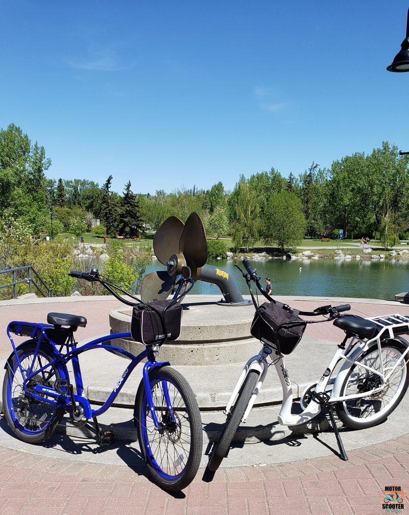 2021 Pedego Interceptor and 2021 Pedego Boomerang in front of Eau Claire