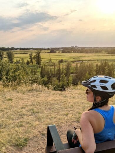 SENA M1 Bluetooth helmet on woman's head as she stares at horizon