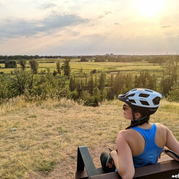 SENA M1 Bluetooth helmet on woman's head as she stares at horizon