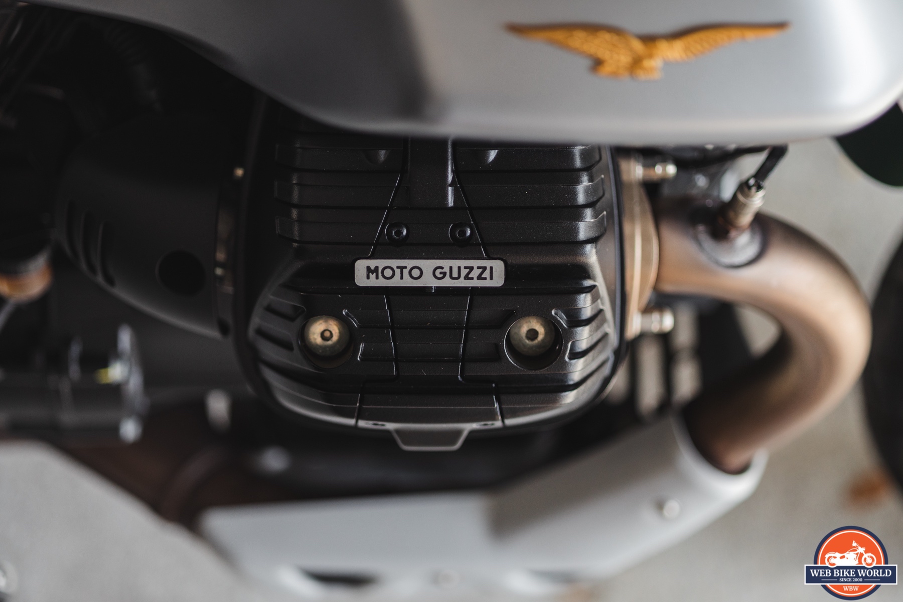 Close-up photo of the right side engine rocker cover on a 2021 Moto Guzzi V85TT Centenario