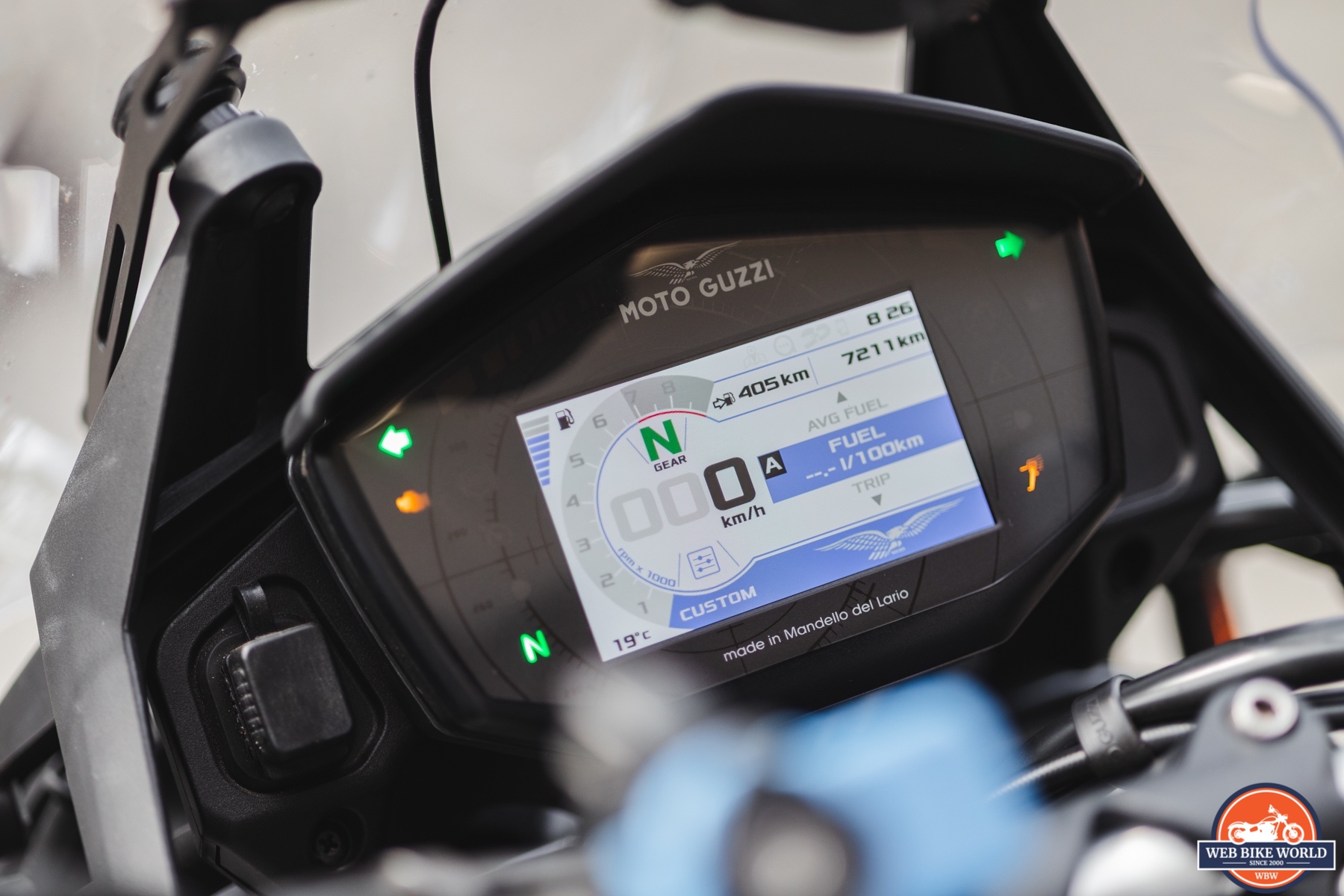 Close-up photo of the dashboard and warning lights on a 2021 Moto Guzzi V85TT Centenario