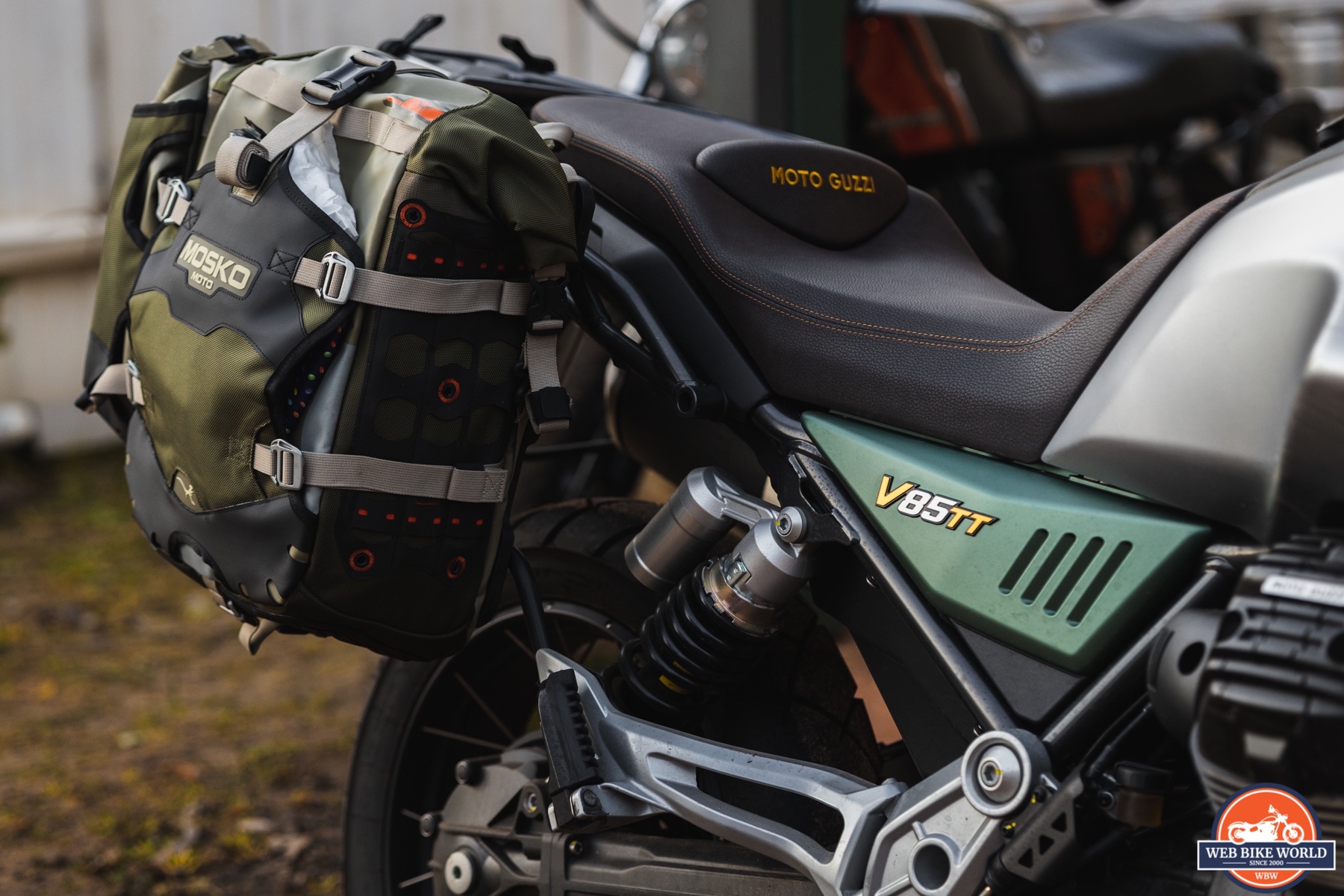 Detail photo of a 2021 Moto Guzzi V85TT Centenario right hand side cover and Mosko Moto Backcountry pannier