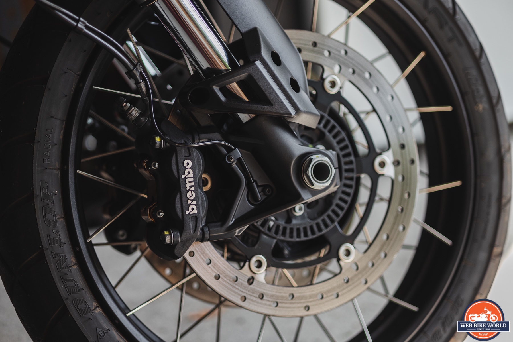 Close-up detail photo of Brembo brakes on a 2021 Moto Guzzi V85TT Centenario