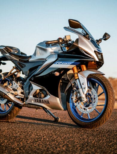 Yamaha's YZF-R15M motorcycle at sunset on a port road in Sydney