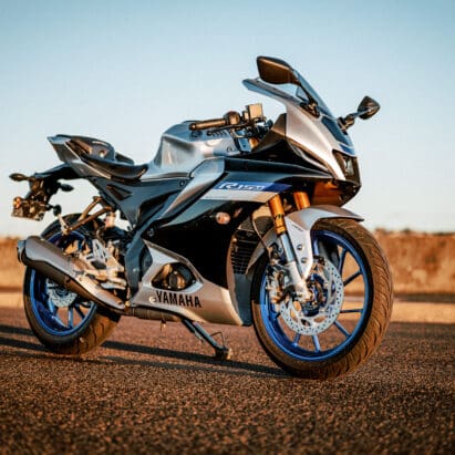 Yamaha's YZF-R15M motorcycle at sunset on a port road in Sydney