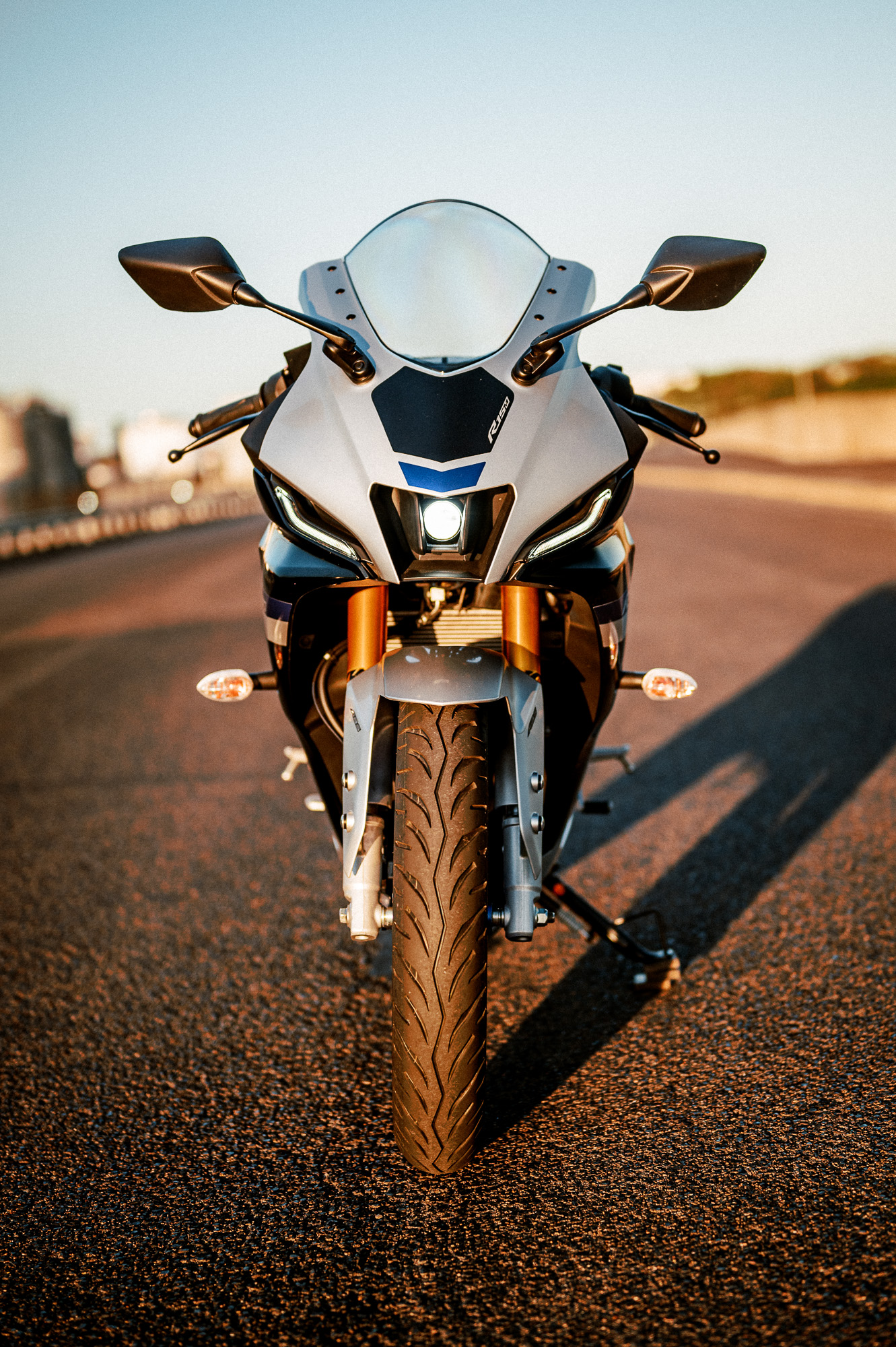 Yamaha's YZF-R15M motorcycle at sunset on a port road in Sydney