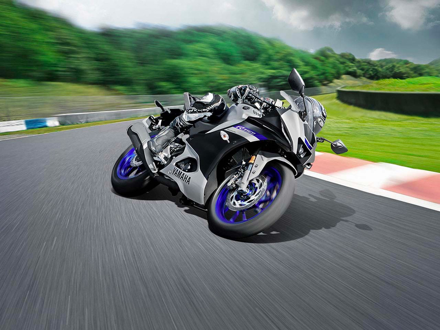 Yamaha's 2023 YZF-R15M motorcycle on a racetrack