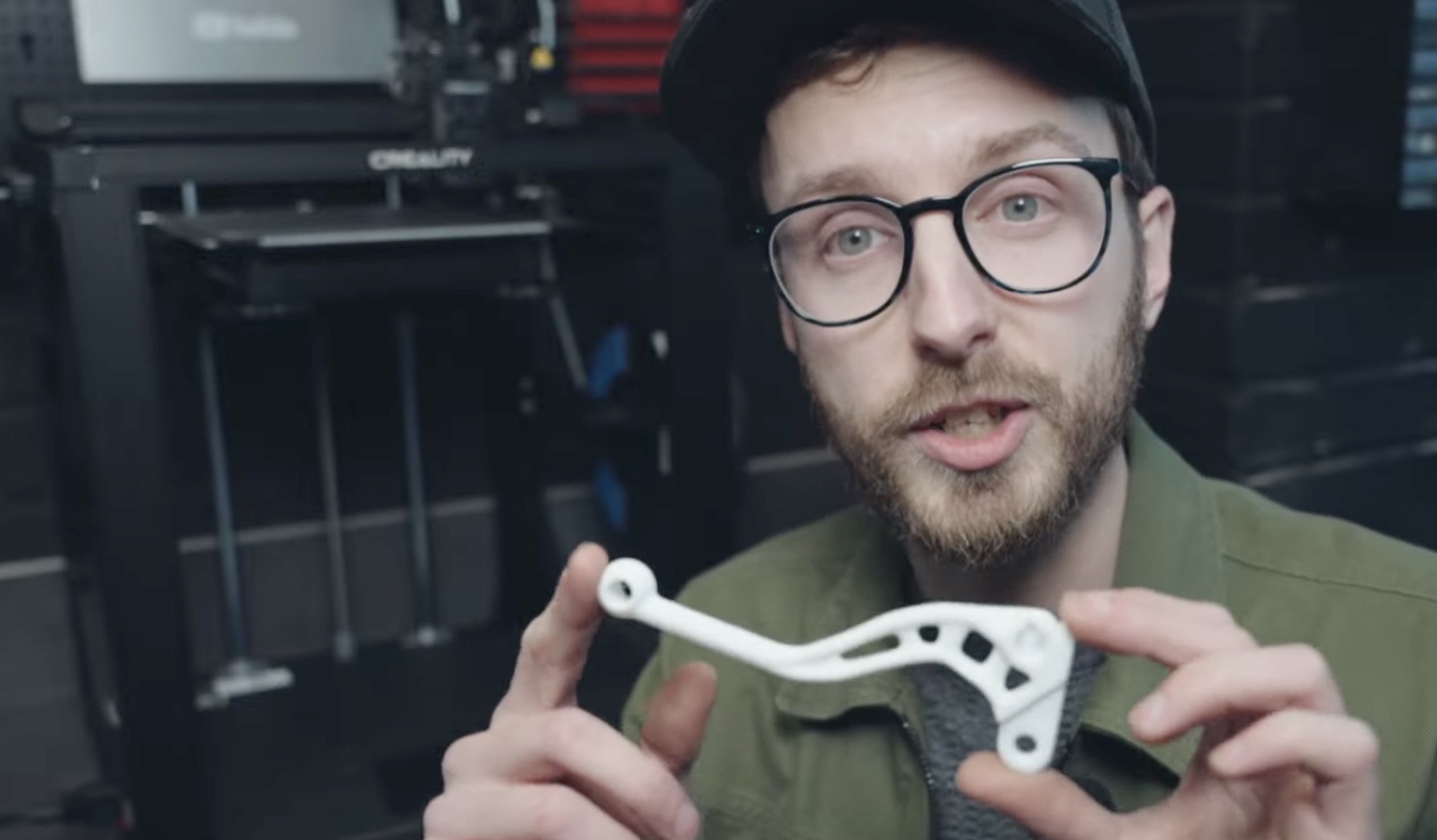 Youtuber Jish on his new Creality Ender-5 S1, which is used to create motorcycle parts for build projects. Media sourced from Jish's video, all relevant rights reserved.