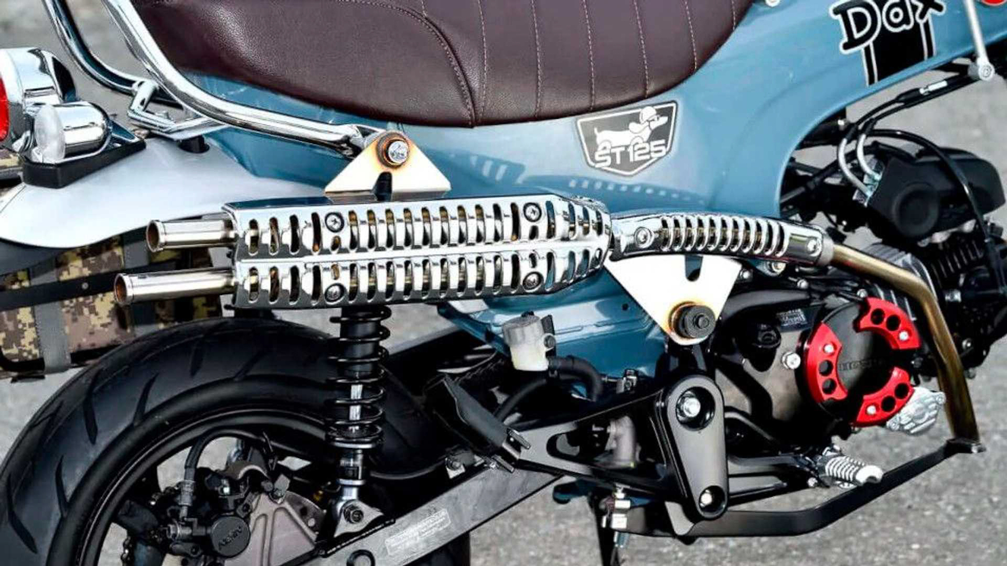The custom DAX125, modded out with part from SP Takegawa. Media sourced from RideApart.