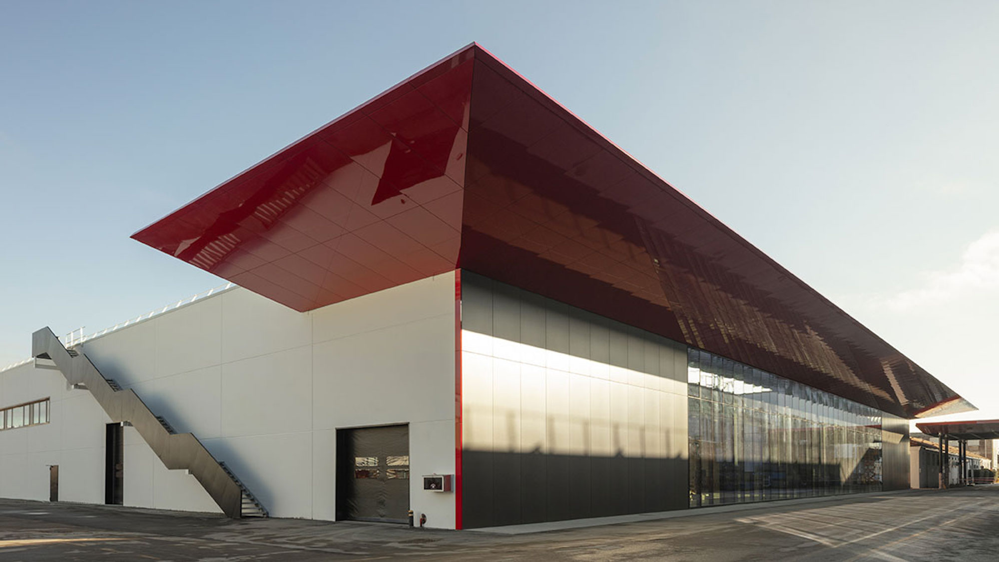 Ducati's all-new eco-friendly building, the Finitura e Delibera Estetica. Media sourced from Money.it.